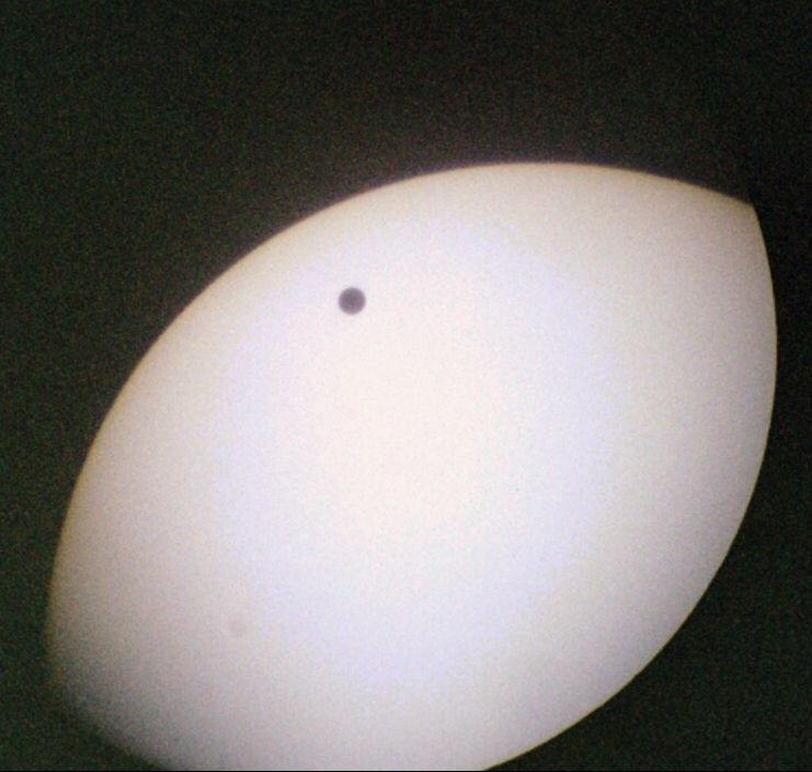 Venus in transit
A rather off-axis image taken during the transit of Venus, using a hand-held point-and-shoot APS camera looking through my 4 inch refractor.
Link-words: Sun Venus Eclipse