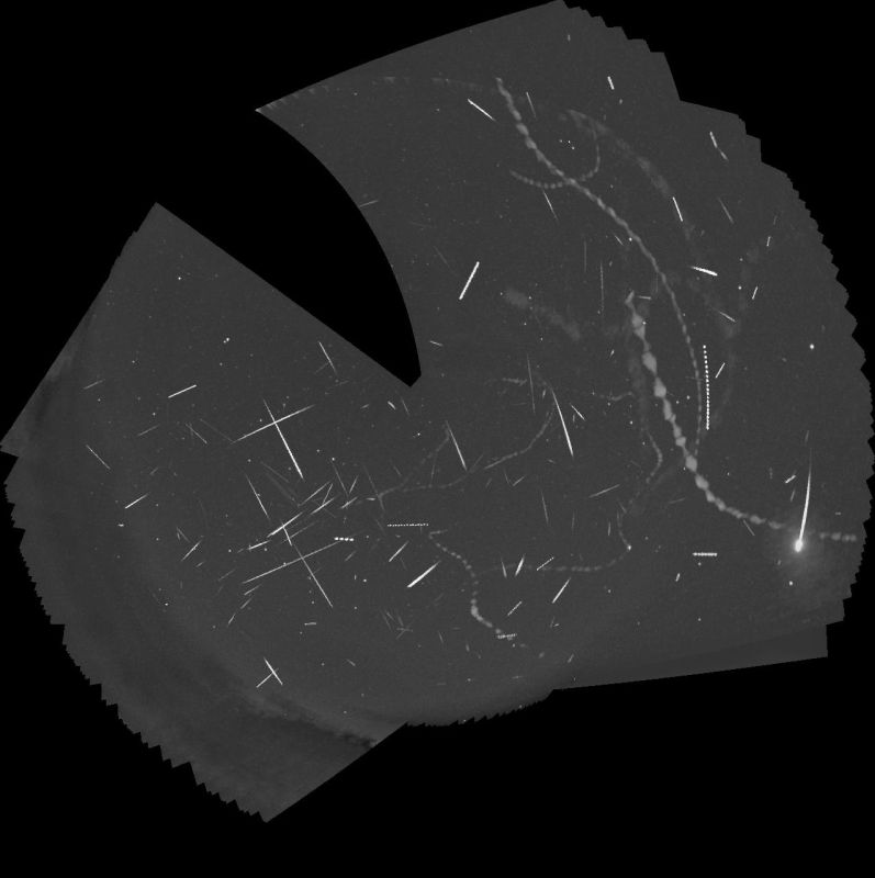 Meteors on the night of 25th to 26th July 2023
This is a tracked stack of the meteors captured by my two Global Meteor Network cameras on the night of 25th to 26th July, 2023. Between them, the cameras caught 137 meteors. Some of the meteors were caught by both cameras. Most of the meteors were sporadics, but the preliminary analysis identified 29 alpha Capricornids, 8 psi Cassiopeiids, 7 July gamma Draconids, 7 Southern delta Aquariids, 4 Northern June Aquilids, and one eta Eridanid. The brightest one (lower right) was a mag. -3.4 alpha Capricornid which was caught by 17 UK-based Global Meteor Network cameras.
