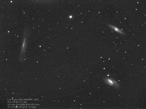 M65, M66 NGC 3628 The Leo Triplet
M65 Is a spiral galaxy 24 million l.y.away.  
NGC 3628 is a fainter edge on galaxy. M66 is also a spiral galaxy at 21.5 million l.y away.   
Link-words: Messier Galaxy