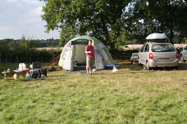 Mike outside yet another NEW TENT!
Our cook, Mike, either thinking of having another drink or planning the evening menu!
