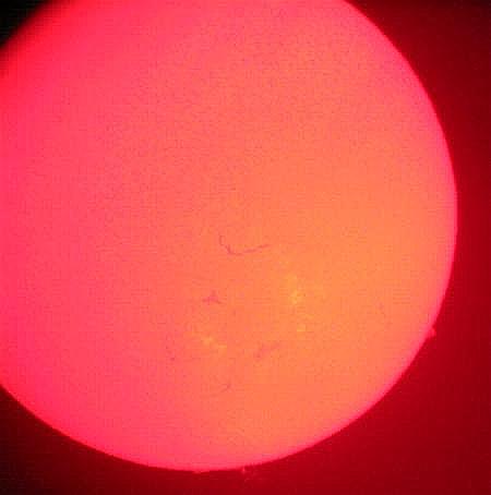 The Sun in H-alpha
Filaments show up on the Sun's surface when it is viewed through a H-alpha filter.
Link-words: Sun