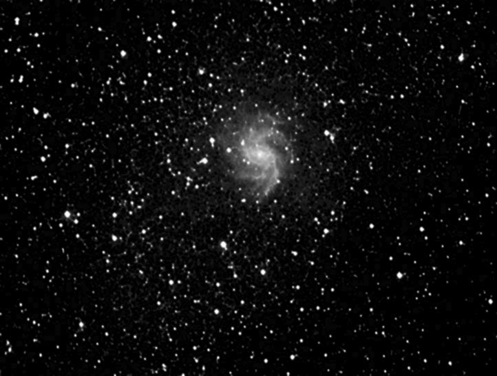 NGC 6946 in Cepheus
This is sometimes called The Firework Galaxy due to the large amount of super novae beeing seen within it.
It is 10mly away.
I may have been lucky to get this, as I was reading that even with an 8" you would be lucky to get it. There are 3 supernovae in this image, but I am not sure where they are.
Link-words: Galaxy