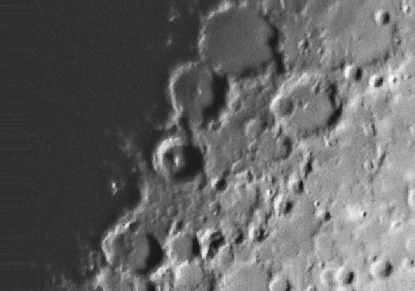 Craters
The Moon is always a good subject. Here we see an almost first quarter Moon's terminator. It's a classic with the three "big three" - Ptolomaeus (top), Alphonsus and Arzachel (bottom). However the surround area also has many other well formed craters especially Albategnius (to the right of Ptolemaeus) and its smaller companion - Klien - embedded in its crater wall.
Link-words: Moon
