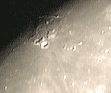 Aristarchus
Aristarchus and the Schroter Valley on the Moon. The crater shows up well in this multiframe video capture shot. By multiplying the frames together in Photoshop™ it is possible to squeeze a little more detail out of the pixels!!
Link-words: Moon