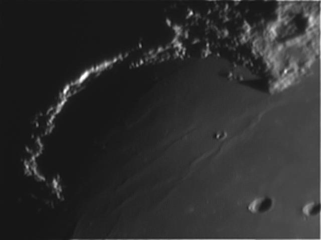 Craters Helicon.
This image was taken a few hours after the previous image, and shows the majority of the crater illuminated now, and the terminator behind the craters ridge.
Link-words: TonyG