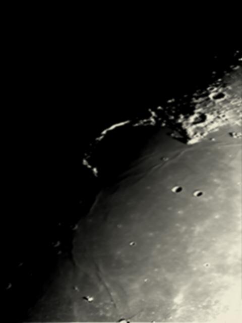 Craters Helicon and Le Verrier in Mare Imbrium and Sinus Iridium.
This image was taken early in the evening on the 16th Feb whilea lot ofthe crater was still hidden along the terminator.
Link-words: TonyG