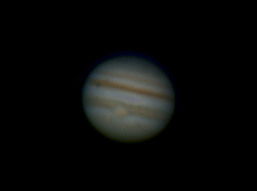 Jupiter from Tuesnoad. 
This is an image taken with a toucam and processed in registax.
The transit of Europa is shown on the top left. There is also something to the lower right of the red spot? Any suggestions?
Link-words: Jupiter