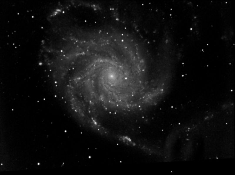 Messier M101 Pinwheel Galaxy
A beautiful face on spiral galaxy located at a distance of about 27 million light years in the constellation of Ursa Major.  At about 175,000 light years across it is nearly double the size of our own Milky Way.

A total of 17 exposures of 5 minutes (badly guided) were used for this image.  There is a bad dust bunny in the lower right middle which I'll get to grips with some day !
Link-words: Messier Galaxy