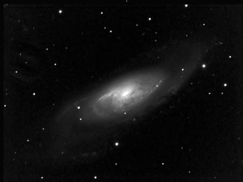 Messier M106
Located only about 25 million light years away in the Constellation oc Canes Venatici.  The galaxy is an example of the Seyfert class with a bright core powered by an active black hole which is producing large amounts of x-rays.

This image has been constructed using 15x200s 1x1 + 6x600s 1x1 + 5x300s 2x2 giving an equivalent combined unbinned exposure time of 210 minutes - shame about the LP !

Need to revisit the processing on this when I understand it a bit more...
Link-words: Messier Galaxy
