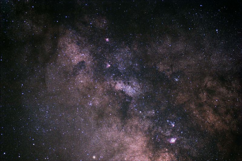 this is an area I always wanted to image but never had the chance till now.  A wide field image centered on M24 the Small Sagittarius star cloud which is a region of our spiral arm with devoid of dust or gas alowing us a viewport to the next arm in our galaxy.

Messiers in the image are:

M24 - Small Sagittarius Star Cloud
M20 - Lagoon Nebula
M8  - Triffid Nebula
M21 - Open Cluster
M18 - Omega Nebula
M17 - Swan Nebula
M23 - Open Cluster
M22 - Globular Cluster
M28 - Globular Cluster
M25 - Open Cluster
M16 - Eagle Nebula

I also managed to spot Pluto at Mag 13.9 covering about 2-3 pixels.

There is an interesting Dark Nebula top left that looks like a spider with four front legs and two eyes surveying the scene.

Imaging: 20 x 300s subframes for a total of 100 mins unfiltered.

Link-words: Star Nebula Galaxy
