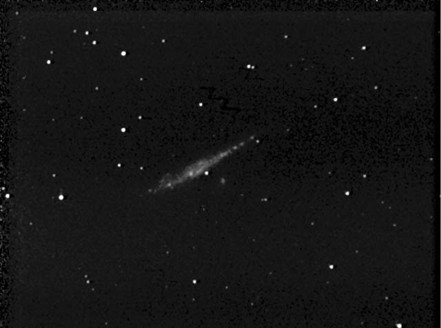 NGC4631
NGC4631 (Best 38, Caldwell 32) is a spiral galaxy located 6.4??? SSW of Cor Caroli (Alpha Canem Venaticorum).  It has a bright, slightly off-center nucleus with a star just north of it, south in this picture. NGC4627 is the small galaxy just 2'-3' to the south in this picture.
Link-words: Galaxy