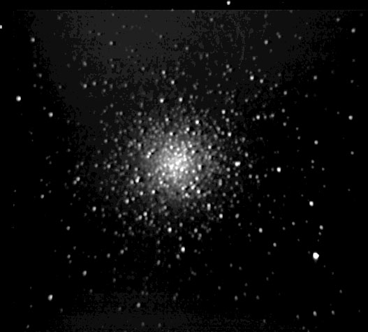 M3
M3 is one of the most outstanding globular clusters, containing an estimated half million stars. At a distance of about 33,900 light years, it is further away than the center of our Galaxy, the Milky Way, but still shines at magnitude 6.2, as its absolute magnitude is about -8.93, corresponding to a luminosity of about 300,000 times that of our sun. M3 is thus visible to the naked eye under very good conditions - and a superb object with the slightest optical aid. Its apparent diameter of 18.0 arc minutes corresponds to a linear extension of about 180 light years; Kenneth Glyn Jones mentions an estimate of even 20 arc minutes from deep photographic plates, corresponding to about 200 light years linear diameter. It appears somewhat smaller in amateur instruments, perhaps about 10 minutes of arc. But its tidal radius, beyond which member stars would be torn away by the tidal gravitational force of the Milky Way Galaxy, is even larger: About 38.19 minutes of arc. Thus, this cluster gravitationally dominates a shperical volume 760 light years in diameter.
Link-words: Messier Galaxy