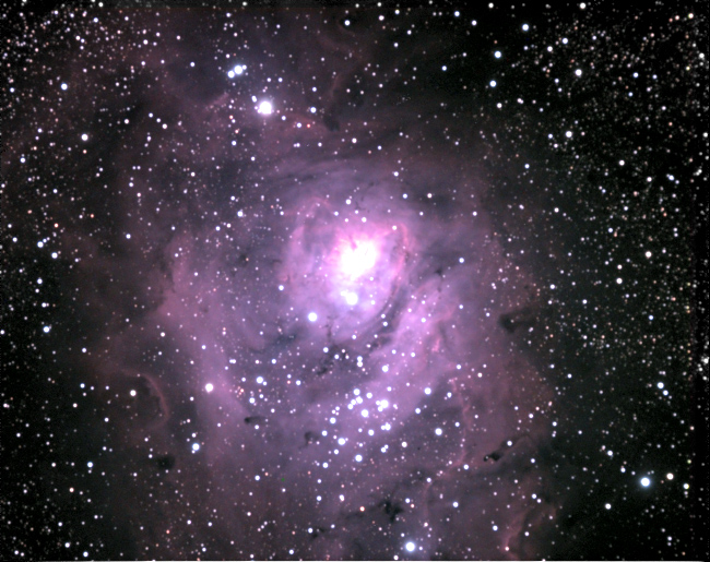 The Lagoon Nebula
The Lagoon Nebula (also known as Messier Object 8 (M8) and NGC 6523) is a giant interstellar cloud and H II region, in the constellation Sagittarius. At an estimated distance of 4,100 light-years, the Lagoon is one of only two star-forming nebulae faintly visible to the naked eye from mid-northern latitudes. In binoculars, the Lagoon is a distinct oval cloudlike patch with a definite core, like a pale celestial flower. The nebula has a fragile star cluster superimposed on it, making this one of the leading celestial sights of summer night skies.
Link-words: Messier Nebula