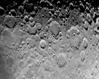 Moon, the area near Clavius Jan 2004
I thought I'd have a go at the moon, despite the wavy effect the atmosphere had on the raw AVI I managed to get some detail from the file. Processed 17th Feb in Registax 4 frames from 161 manually-selected and wavelet processed.
Link-words: Moon