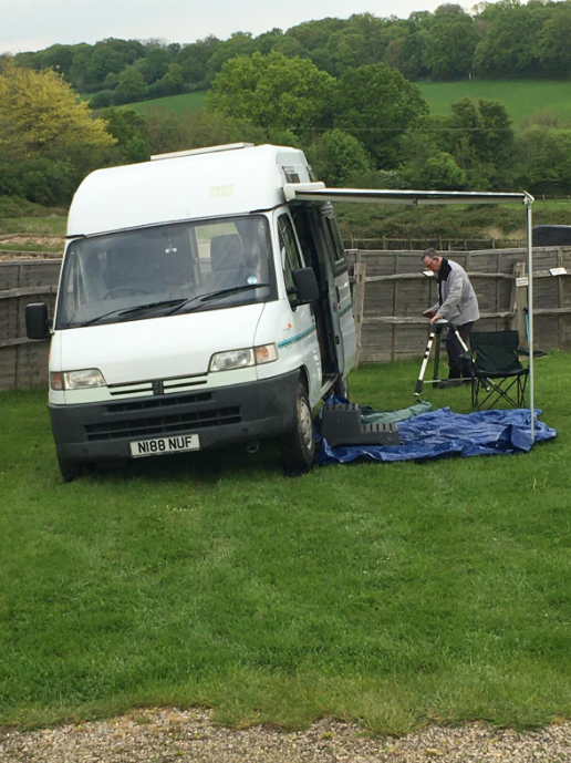 Dave Taylor sorting out his campervan after it was pushed out of the Mud by Chris Simon and Mark
Link-words: DSC May 2024