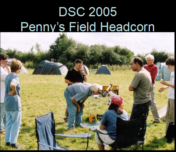 DSC Penny's field Headcorn 2007
A Member ? Doug, looking through a solarscope, with members watching, including Gred, Delphine and Jim Rachel plus others. 
Link-words: Campsites2007