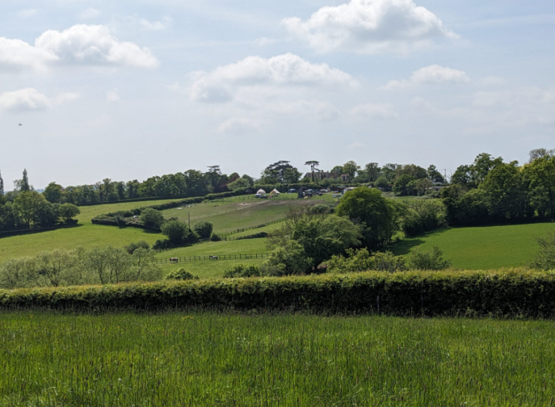 A distant view of our small DSC at cairds perched on the hill
Photo by Michael Griffiths
Link-words: Campsites2024