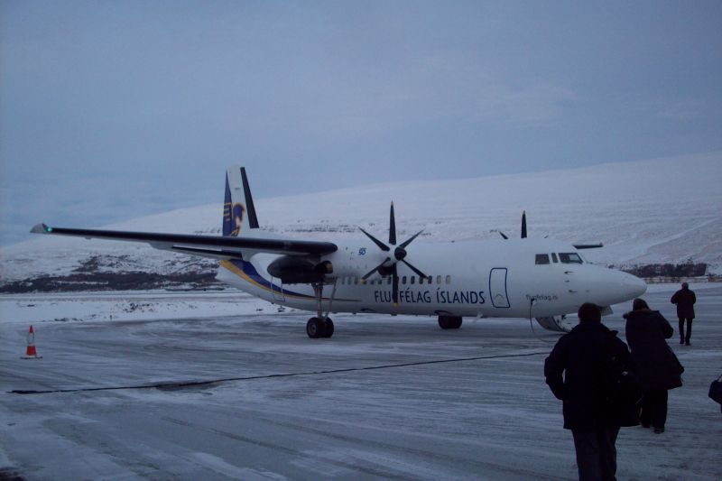 Landing in Akureyri Iceland 
Quite nervous landing on an ice covered runway.  We saw another glory on the flight.  
We were met by a guide who took us on an interesting tour en Route to Lake Myvatn which many geological features 
Link-words: CarolePope Iceland2012