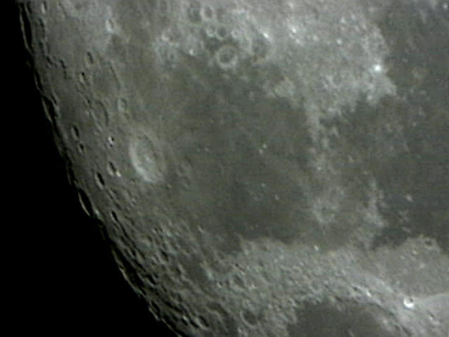 The Moon - Mare Fecunditatis
My first attempt at webcam imaging. Celestron Neximage Solar System Imager. 8" Orion Skyquest Dobsonian. Imaged from Orpington (Southeast London). Using the "drift method" though this is actually an unprocessed still. I have some video footage but need to figure out how to process it. Very flat/2D due to the full Moon. Crater Langrenus prominent in the left of the image.
Link-words: Moon