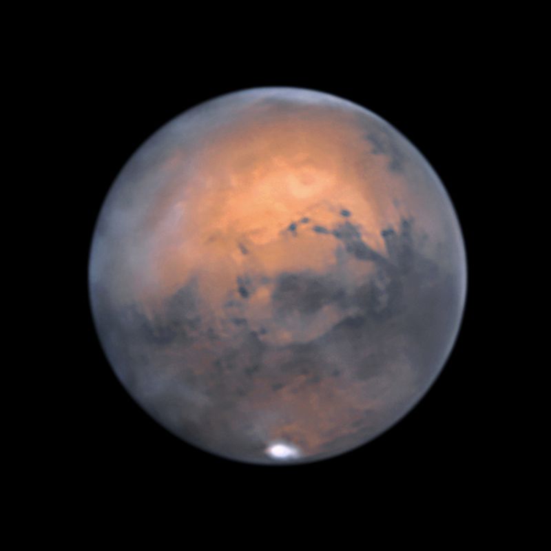 Mars 2-weeks after opposition
Surrounded by a light area south of Valles Marineris, Solis Lacus (Lake of the Sun) looks like a planet-sized pupil, famously known as The Eye of Mars. 

While in the upper left, Olympus Mons emerges from the northern clouds. 
