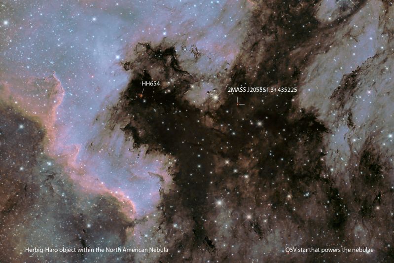 Zoomed-in region of the previous North American Nebula image
I did some research to find out which star was the UV source causing the nebula to glow. It turns out to be a star hidden behind the dark lane of dust seperating the North American and Pelican nebulae (LDN935). The star's name is 2MASS J205551.25+435224.6 (!) and appears as the  heavily reddened 13 magnitude object shown. I was also intrigued by the red patch of nebulosity in this image. It turns out to be a Herbig-Haro object - a young star in the process of being born that is ejecting a jet of material from its poles and causing the surrounding molecular cloud to glow. 
