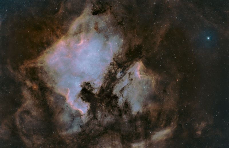 North American and  Pelican Nebulae in SHO palette.
First serious image after optimising my new portable rig.
