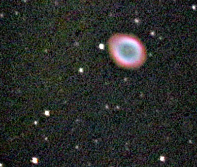 M57 The Ring Nebula
M 57 lies in the constellation of Lyra, between gamma and beta Lyrae. Through any small scope the round almost colourless ring comes into view. Ian's picture captures it beautifully.
Link-words: Messier Nebula