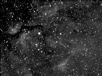 Gamma Cygni
The bright star is Gamma Cygni. Most of the surrounding nebulosity is IC 1318, including the Butterfly Nebula to the left. The dark nebula way to the right of Gamma is Barnard 343. At bottom right is the Crescent Nebula (NGC 6888).  The cluster way under Gamma is M29. There are many other catalogued objects in this field of view
Link-words: Messier Nebula