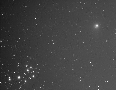 Pleiades and Comet Macholtz
"I don't quite know how I managed to get this, it was pretty much 8/8 cloud and even for this 'clear' shot I was shooting through high cloud, so apologies for the lack of detail."
Link-words: Comet Messier Star