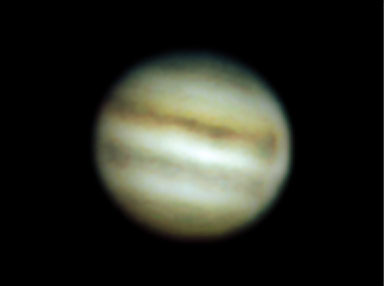 Jupiter 2002
Mike says "Here is a pic of Jupiter I took on the night of the 6th Feb at approx 2145. 
"This is my first attempt after having the mirrors realuminised and the scope collimated. 
"There is a definite increase in detail and colour over my previous attempts.  Considering the scope is unguided it's not bad. 
"I took an AVI of around 400 frames and picked out approx 80 that were good, then combined them in astrostack with some unsharp mask and deconvolve, then finally converted to CMYK in Photoshop and tweaked the 4 channels before recombining into RGB. 
The darker patch at the bottom right is I think the transit shadow of Io - I could definately see the shadow visually through the eyepiece. 
Greg Smye-Rumsby adds "Getting detail as fine as this with an undriven 4" newtonian telelscope demonstrates that Mike is indeed a fine and accomplished astrophotographer!"
Link-words: Jupiter