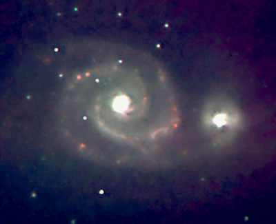 M51
M51 in Ha, OIII and Blue, The famous Whirlpool galaxy M51 was one of Charles Messier's original discoveries. He discovered it on October 13, 1773, when observing a comet, and described it as a "very faint nebula, without stars" which is difficult to see. Its companion, NGC 5195, was discovered in 1781 by his friend, Pierre M??chain, so that it is mentioned in Messier's 1784 catalog: 'It is double, each has a bright center, which are separated 4'35".  The two atmospheres touch each other, the one is even fainter than the other.' NGC 5195 was also recorded by William Herschel, who assigned it the number H I.186.
Link-words: Messier Galaxy