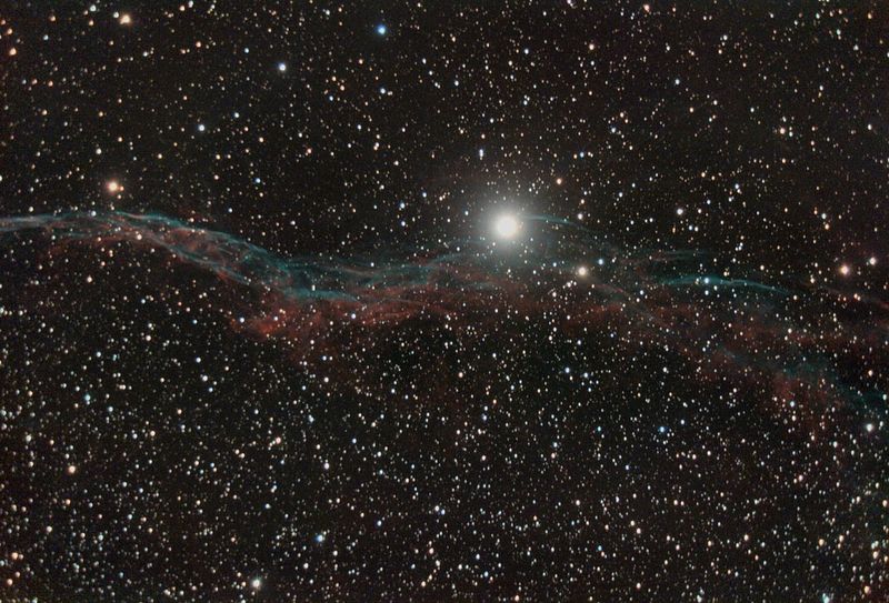 Veil Nebula (Witches Broom)
22 x 5min exposures with a modified Canon EOS 350D.

A bright doughnut (reflection from the focal reducer) was removed in Photoshop.
Link-words: Nebula
