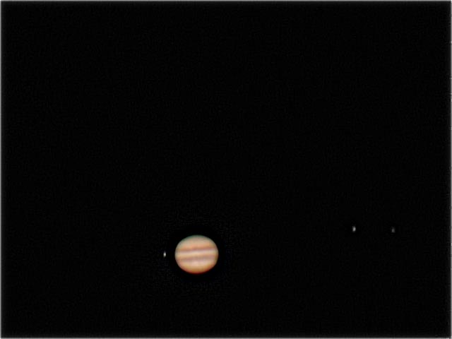Jupiter, io, Europa and Ganymede 
Jupiter with 3 of it's moons, Callisto is beyond the frame of the picture, way out to the left.
Link-words: CarolePope