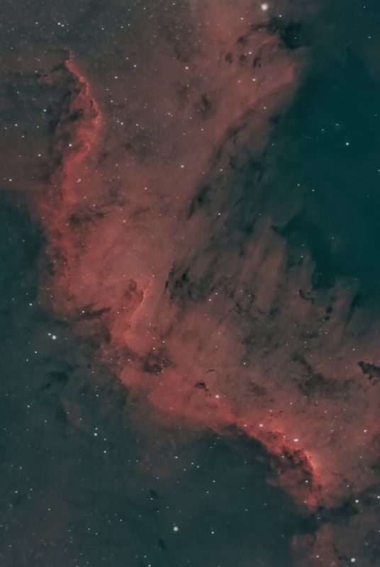 The Cygnus Wall in the North America Nebula in Cygnus
35x 120s 1h 10m. Gain 1600, Offset 30, Temp -5c. Processed the same as my previous version except no SCNR in PixInsight. Reducer flattener spacing was increased in line with new information discovered on Teleskop Expresses website - about time too! Guiding was changed to Off Axis Guider from 190mm guidescope resulting in tighter stars.
