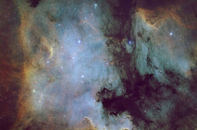 Pelican Nebula 
13 hours using Optolong 3nm Dual-Band L-Ultimate H-alpha and Oxygen III and and Askar ColourMagic 2" 6nm OIII/SII Duo Band D2 filters

Link-words: Nebula