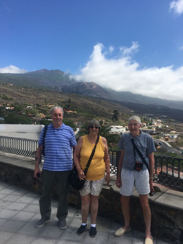 Vocano 2021 La Palma
A view of the 2021 Volcano 
Dave Allen, Carole and Adrian Pope
This place where we were being photographed is where 100s of World News reporters stood to photograph the Volcano 
Link-words: LaPalma2024